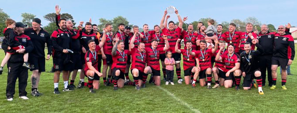 Tenby United celebrate